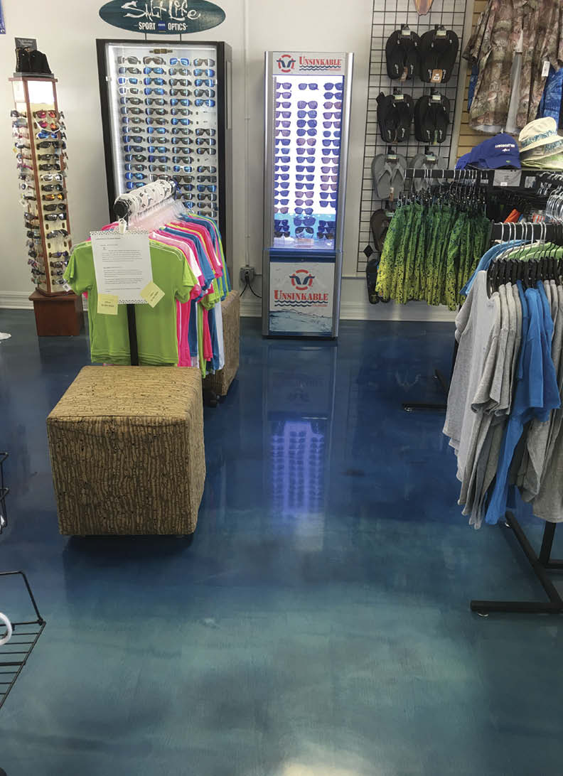 A retail shop with blue epoxy floors.
