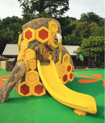 A slide built into a tree trunk made of GFRC in the Smithsonian National Zoo.