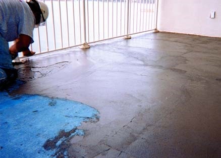 Repairing cracks in the deck or balcony must be done prior to an overlay system.