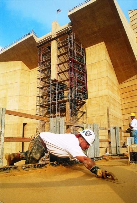 Los Angeles Cathedral avoided surface defects in it's integrally colored concrete by positioning the forms as close to their final position as possible to avoid flow lines in the concrete.