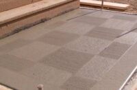 Checker board look with a brush or broom finish on a Concrete Surface