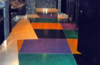 polymer-modified cement floor in a geometric bright pattern