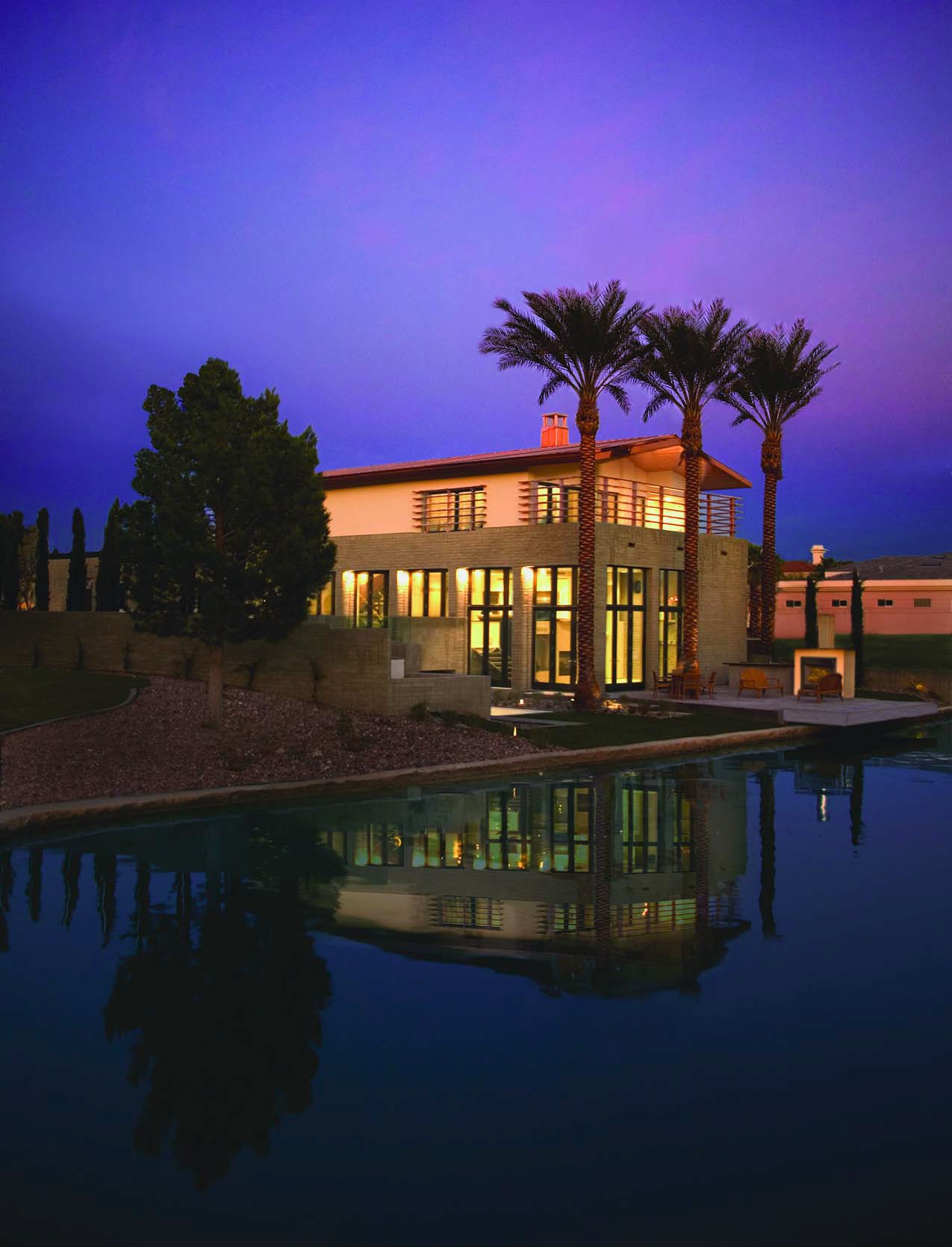 Constructed by Merlin Contracting, L.L.C., the $1.9 million, 5,180- square-foot New American Home 2004 is in the luxury community of The Lakes at West Sahara, about 15 minutes from the Las Vegas Strip.The home is described to have a modern loft design.