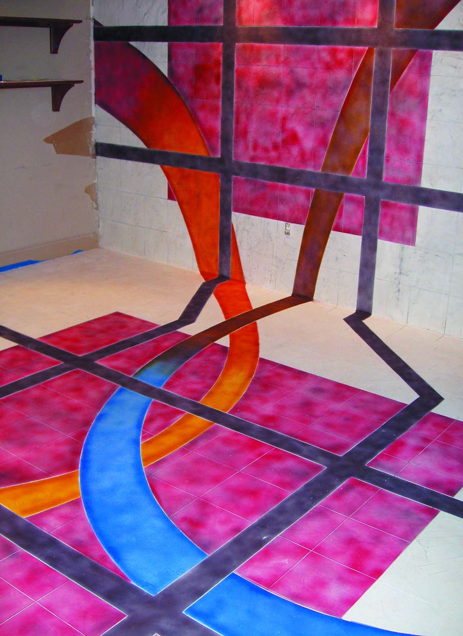 A skim coat carried up the wall. All colors were achieved with solvent based dyes. Dyes can broaden your color palette, create subtle effects not possible with other coloring agents, and fix problems with acid stain applications.