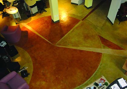 After photo of a stained concrete space.