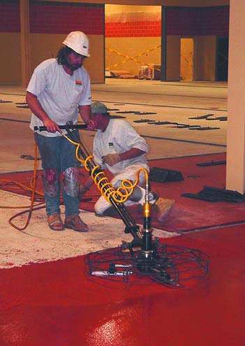 A walk-behind power trowel handles like a waxer, Varel says. The trowel is constantly trying to push you over. They are tough to operate. You have to find somebody willing to build up the calluses and muscles to operate that guy.