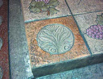 The accent that is for sale right now features a plantlike design roughly similar to Customs fleur-de-lis stamp pattern. Upcoming designs include a rose pattern, a star pattern and a Greek theme.