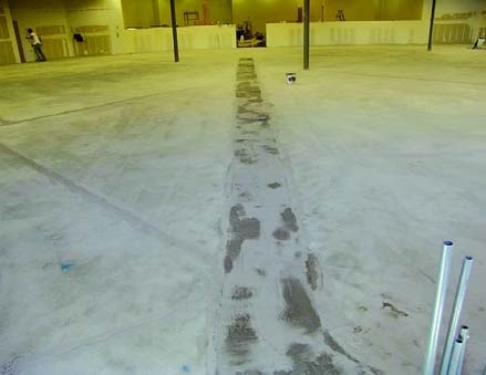 Patching concrete prior to installation of a seamless floor coating.