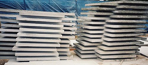 Concrete Countertops by David Jack Corp used in mass production of concrete topped side tables.