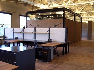 Concrete Countertop in finished location after mass production of the almost 500 table tops in concrete - t has cast concrete tops in bulk before too, in the range of 50 to 100 for a restaurant.