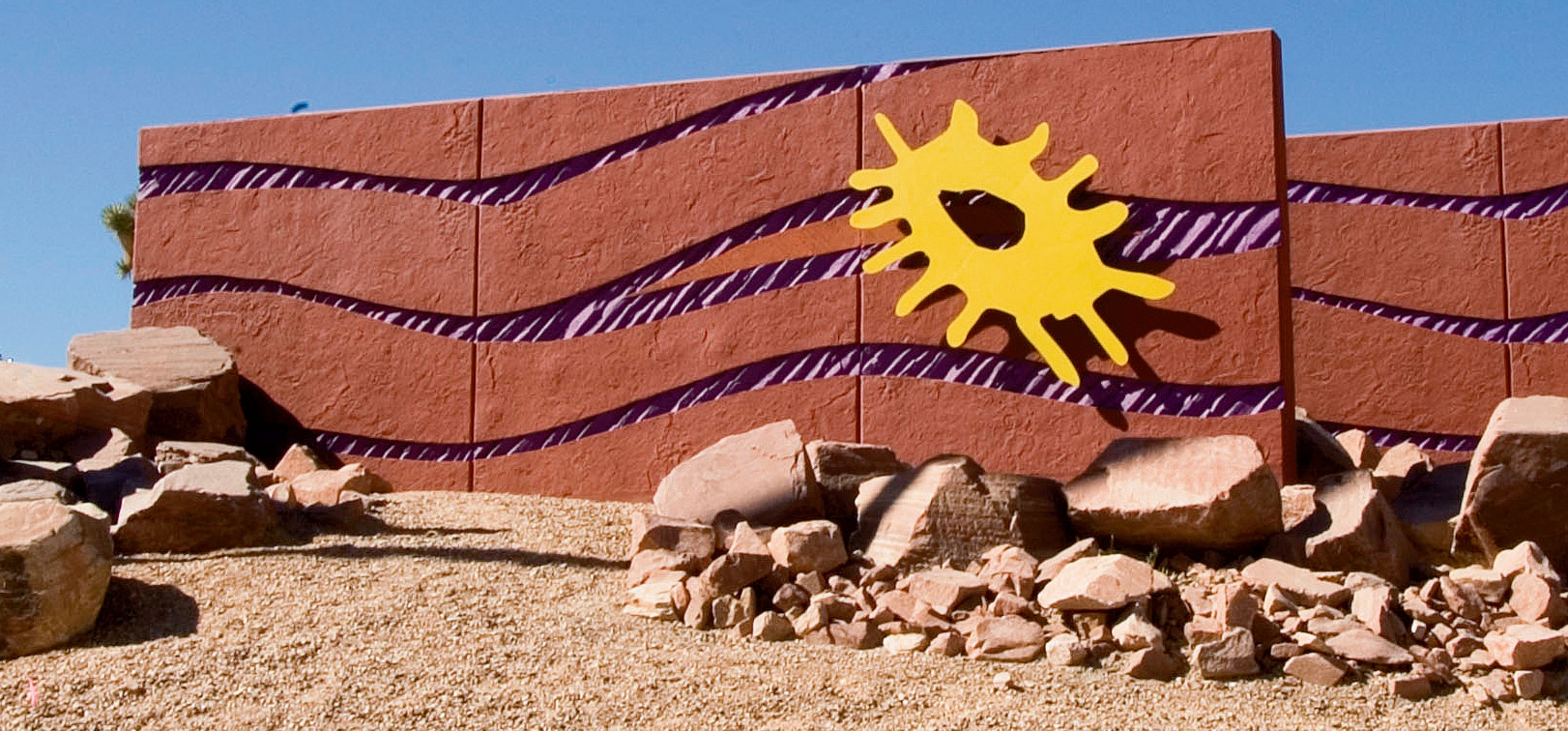 "Spaghetti Bowl" (seen at the intersection of Interstate 15, Interstate 515 and U.S. 95 in Las Vegas) was designed with a flowing wave of color and texture combining three Scott System patterns: Rocky Mountain Flagstone, Oregon Basalt and Striated.