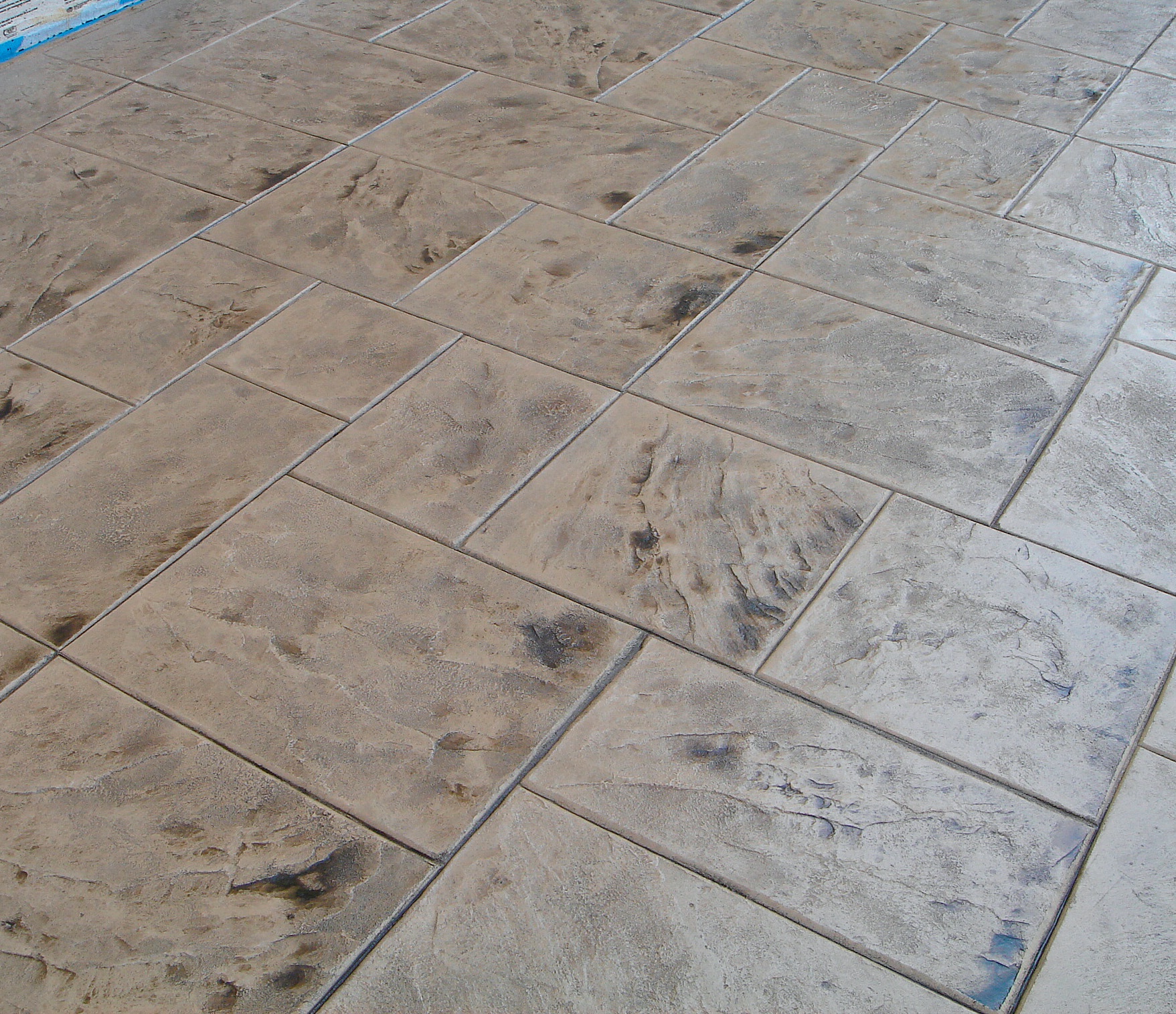 Stamping Concrete Overlays tips and techniques from the professionals.
