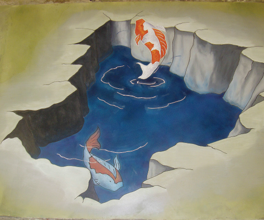 Engraved concrete of a whole in the ground with koi jumping out of water.