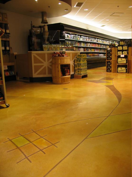 A supermarket with a stained concrete floor.