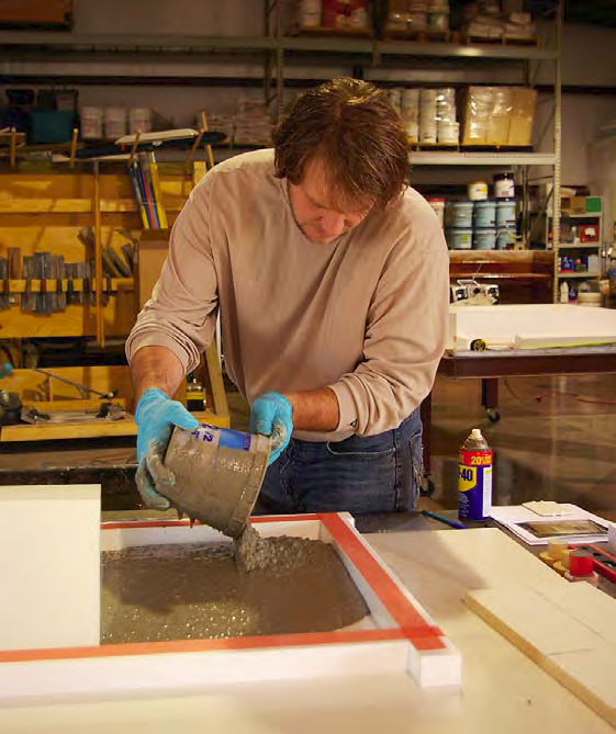 Mike Eastergard using concrete forms to cast concrete.