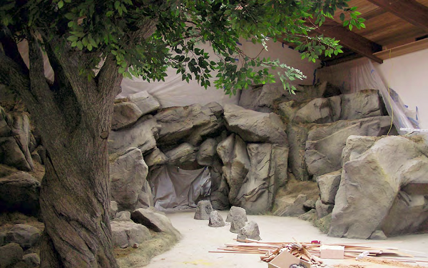 This natural-looking setting under a GFRC tree will display hunting trophies for the homeowner.