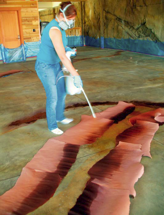 Additional dye strata. This worker is flashing with orange-brown dye to create two hard torn-paper edges.