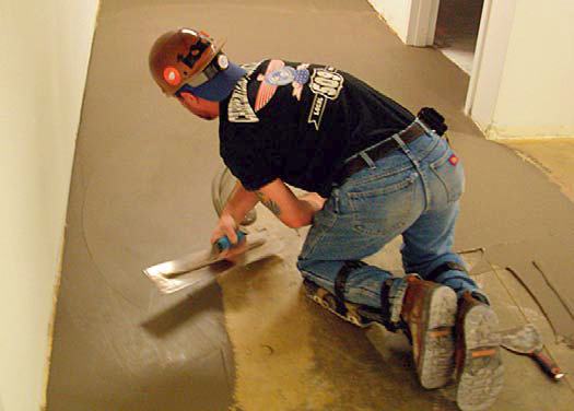 SkimCrete XL, from Dependable Floor Products, is being applied here as part of the companys Moisture Suppressant System.