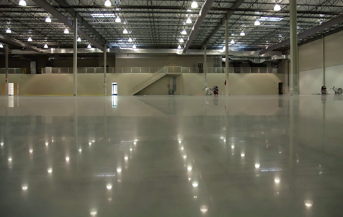 A Large warehouse that has been mechanically stripped to a polished sheen