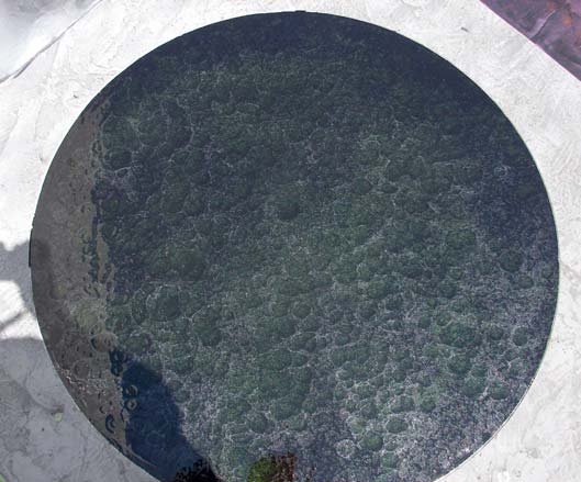 Metallic epoxy overlayment in black and white.