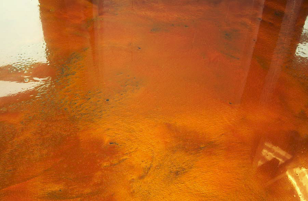 Abstract Concrete installed this concrete floor at the Labatt Blue Light Jungle Bar at Comerica Park in Detroit, Mich. using a mix ratio of 6 ounces of Elite Crete Systems Reflector Enhancer per gallon of epoxy. In order to achieve this unique look, the metallic pigment load was changed.
