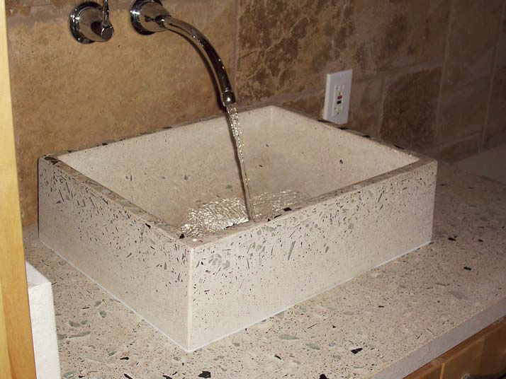 Jim Ralston of Urban Concrete Design uses GFRC exclusively when making countertops and fireplaces. His application methods involve a peristaltic pump and a spray gun, as well as hand-packing.