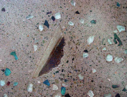 The studio ? oor at the Benicia, Calif., of? ce of The Concretist was seeded with broken post-industrial glass and bits of scrap steel, then diamond-ground for better exposure and sealed with a solvent-based acrylic.