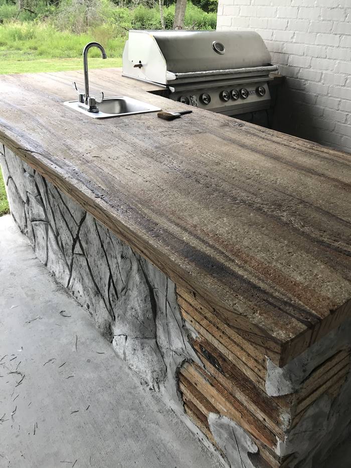 Outdoor concrete countertop made to look like wood.