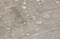Concrete with water beading up on it