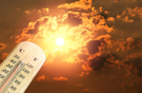 A hot sun with a thermometer measuring the temperature.