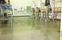 A warehouse space finished with bonded abrasive polished concrete