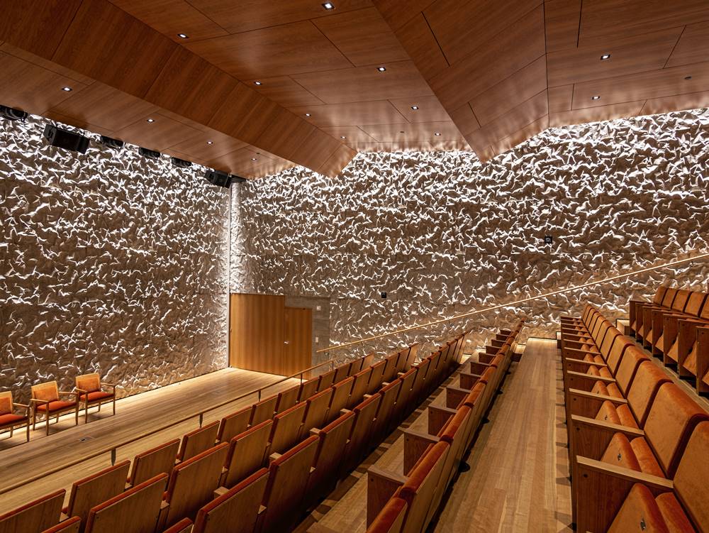 Vertical concrete inside the Kennedy Center made to look like crinkled concrete