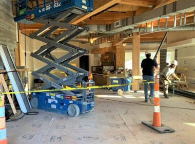 Skudo floor protection protects from large equipment like this lift.