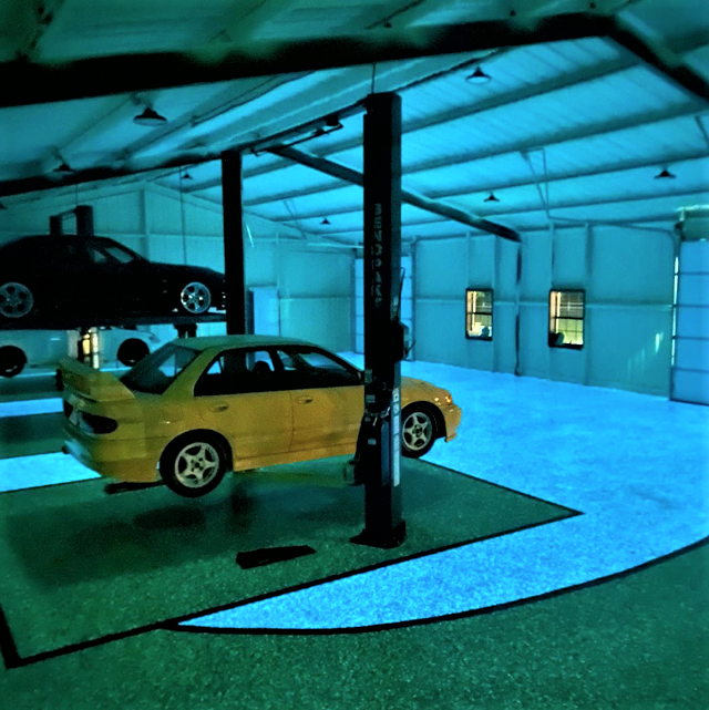 durable resinous garage is a one-of-a-kind showpiece that glows in the dark