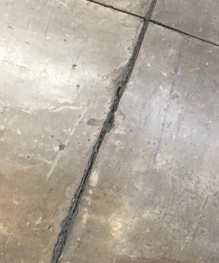 Cleaning cracks properly is a big issue. Using joint filler can help.