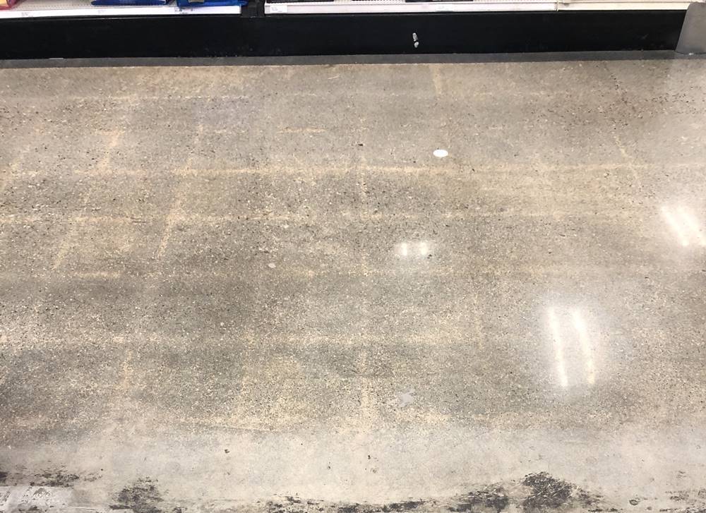 Ghosting images on a concrete floor.