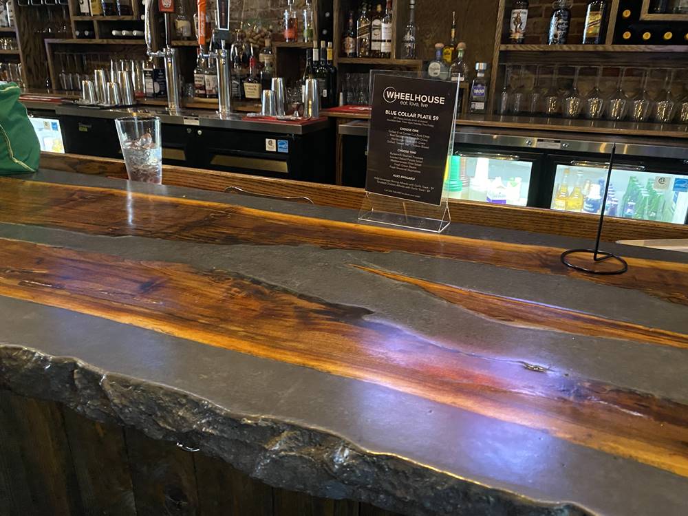 a bartop made of concrete that shows concrete countertop creativity