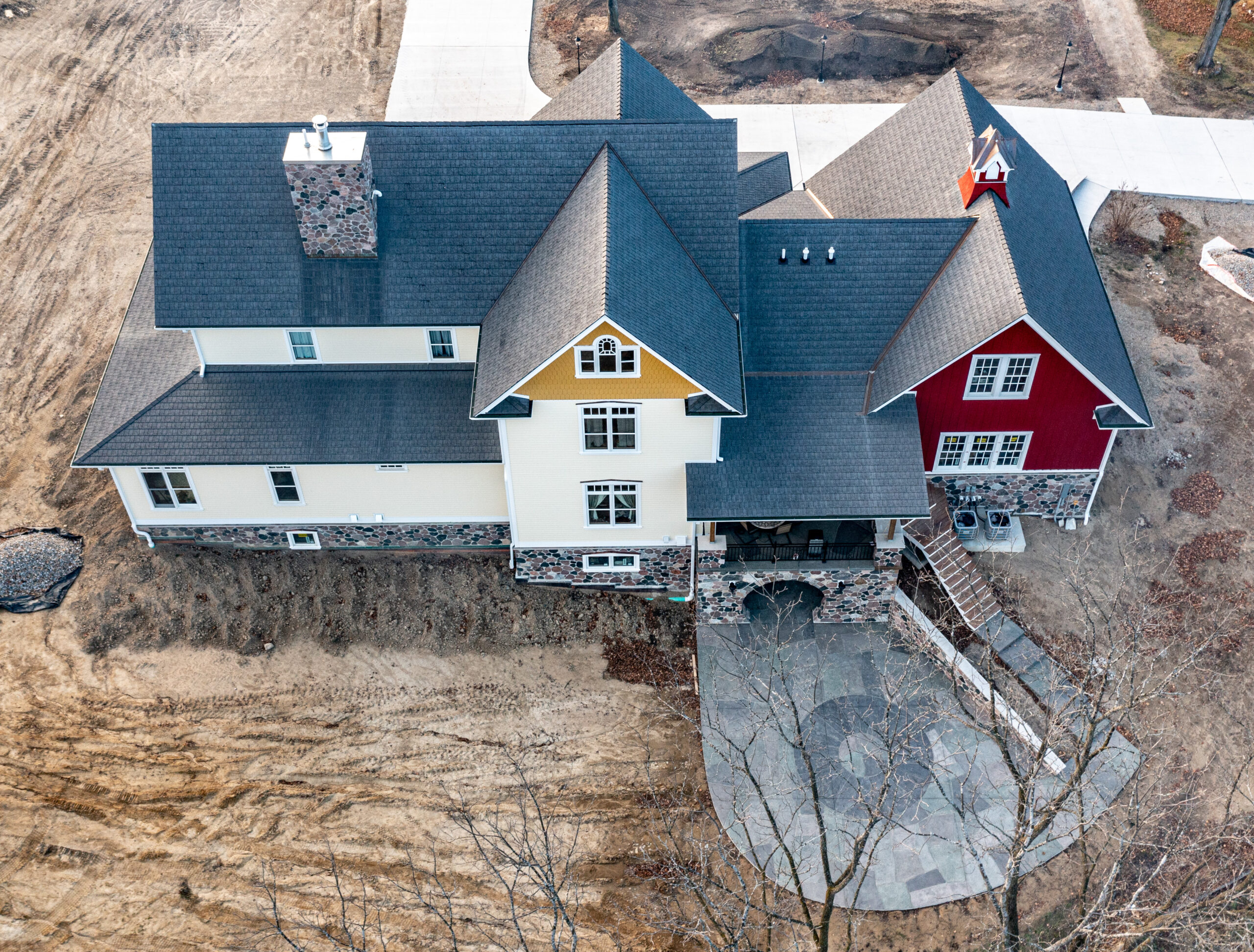 an aerial shot of a house with a concrete patio that was finished using Stone Edge Surfaces products