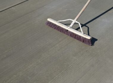 Broom finishing macrofiber-reinforced concrete