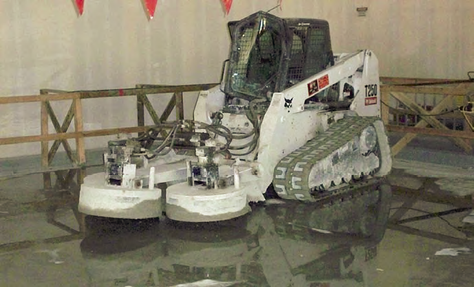 Diacons modified Bobcat T250 concrete grinder didnt just help with the Solyndra project. It also served as an entry barrier during President Obamas visit to Fab 2 in May.