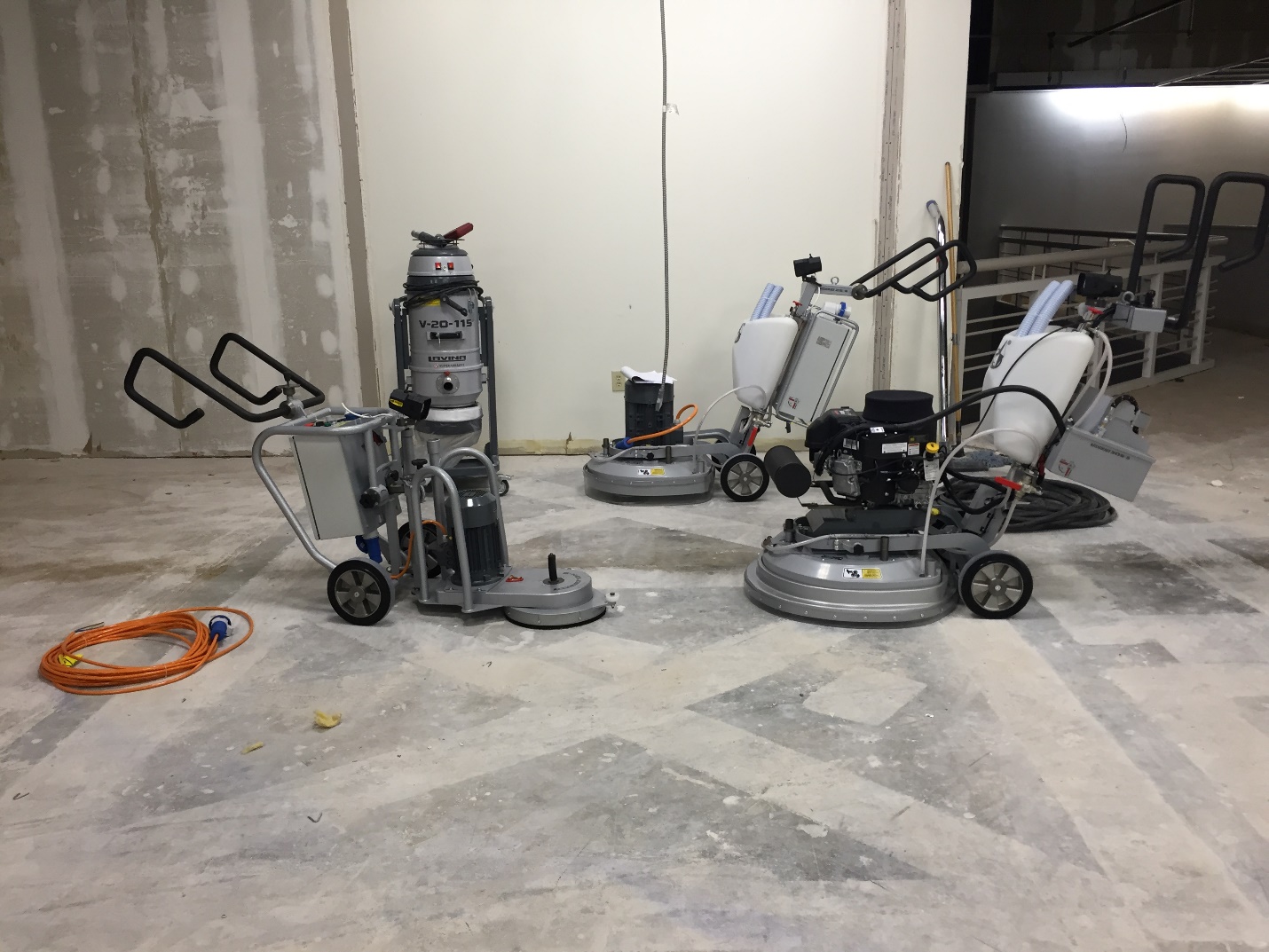 Three Lavina machines put to work on the concrete floor.