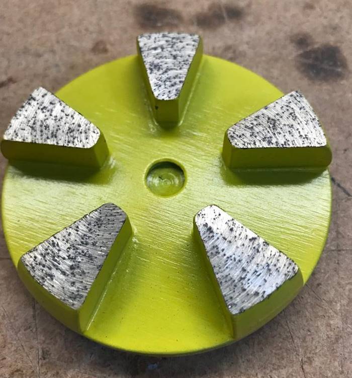 coarse aggregate floor can be made visible with a grinding disk like this