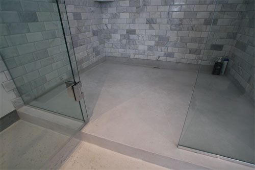 The Becker Architectural Concrete designers and technicians worked out a hybrid system of casting, pressing and polishing several of the elements in place to create large, seamless elements that would have been prohibitive to cast off-site.