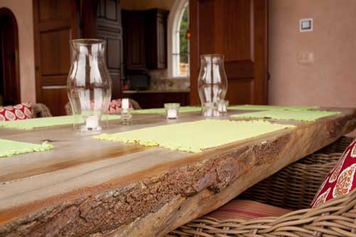 Edge of the concrete table that actually looks like a wood plank.