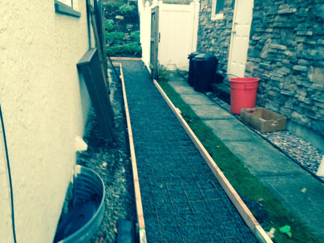 The Stroups poured the small section of walkway from the steps to his front porch before completing the rest of the work