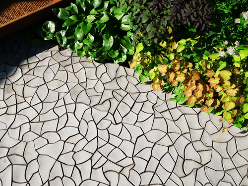 Additional KAZA feature in the RBC Waterscape Garden are the large concrete panels (28 of them) bordering the raised beds.