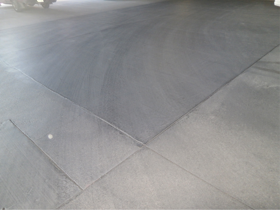 Miracote parking garage restoration - Test results #3, 'after' picture. Drive lane in turn radius after one year.