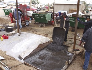 Slab with iron-based concrete resembles conventional portland-cement concrete, but embedded pipe used to inject carbon dioxide replaces steel rebar. Photo Courtesy of David Stone