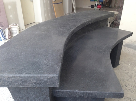 Rustic reception table in dark gray concrete