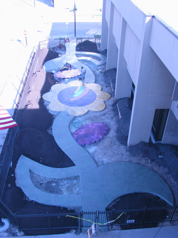 Brilliant Crescent Bronze color Decorative concrete blooms in Children's Garden